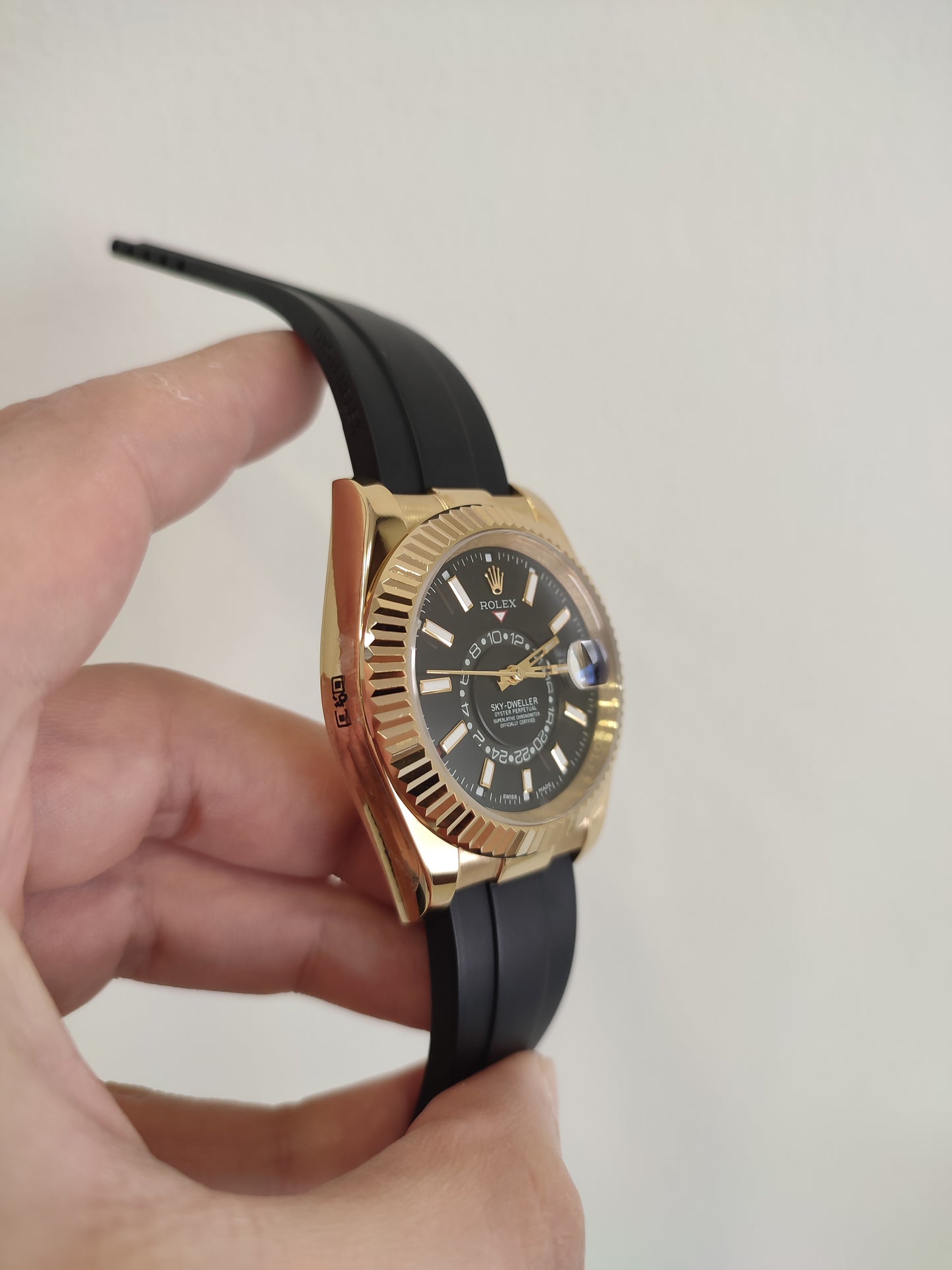 Skydweller gold bezel black dial oyster flex