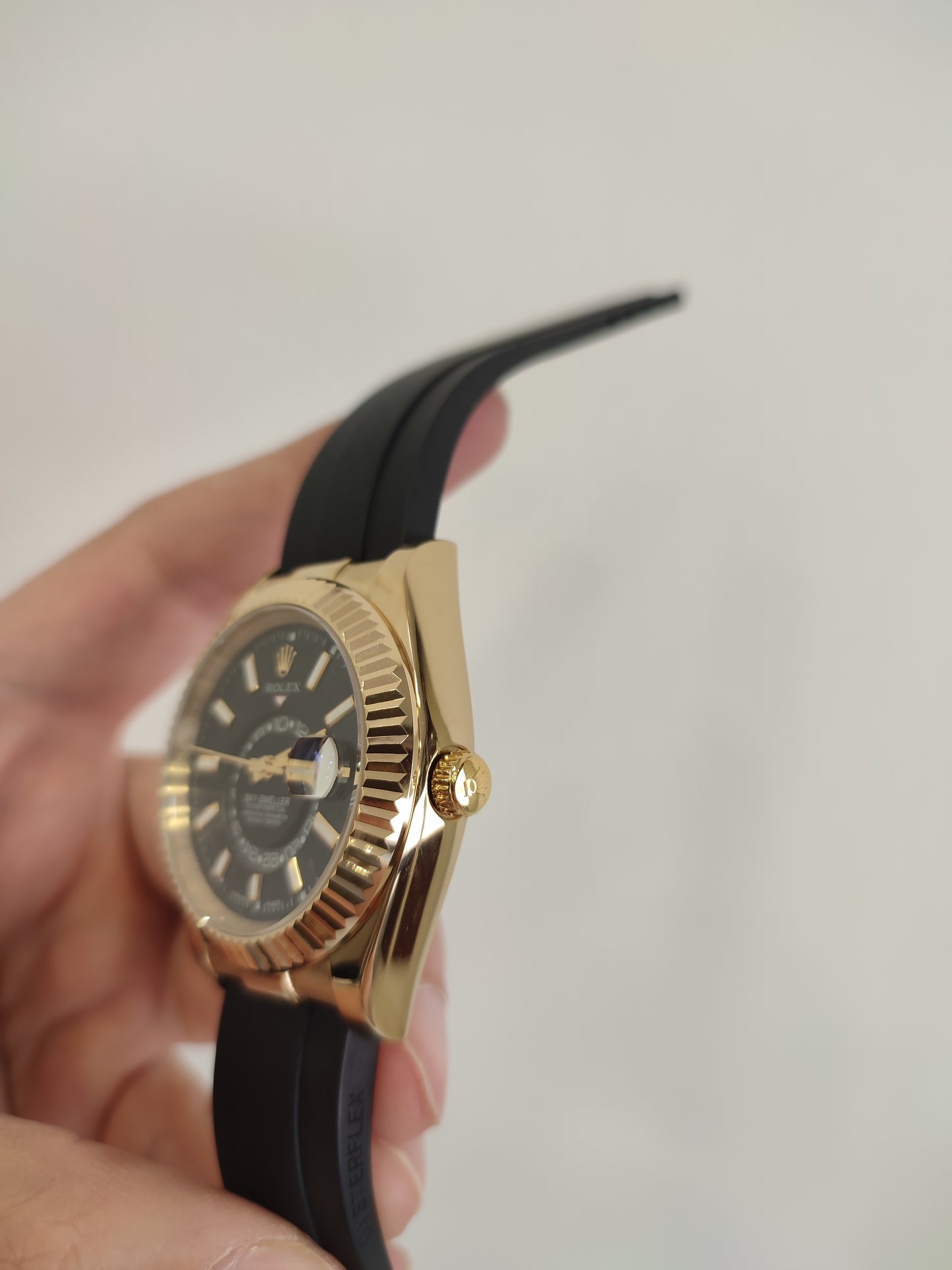 Skydweller gold bezel black dial oyster flex