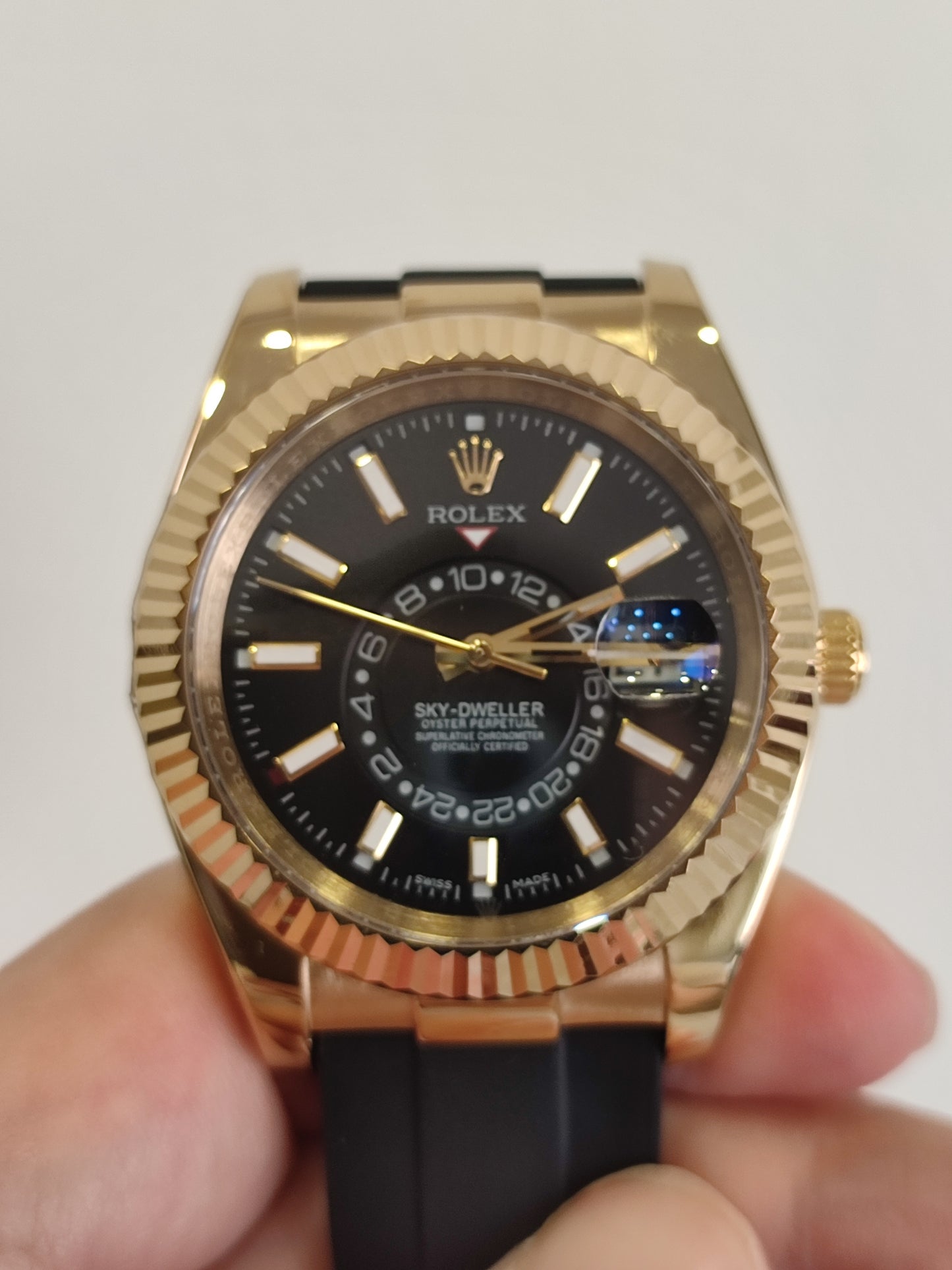 Skydweller gold bezel black dial oyster flex