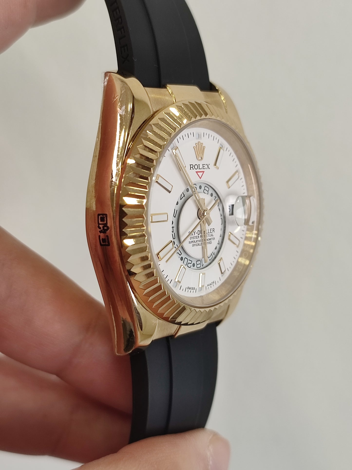 Skydweller gold bezel white dial oyster flex